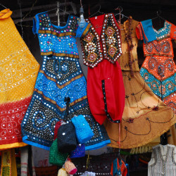 Packing list for India clothes in marketplace / bazaar of Pushkar, Rajasthan, India