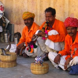 photograph of snake charmers in Jaipur, India,