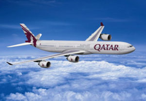 photograph of Qatar Airways jet in flight