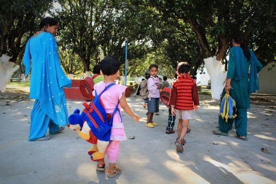 AA - children, teachers Teachers and children arriving at Aurovalley Ashram, India