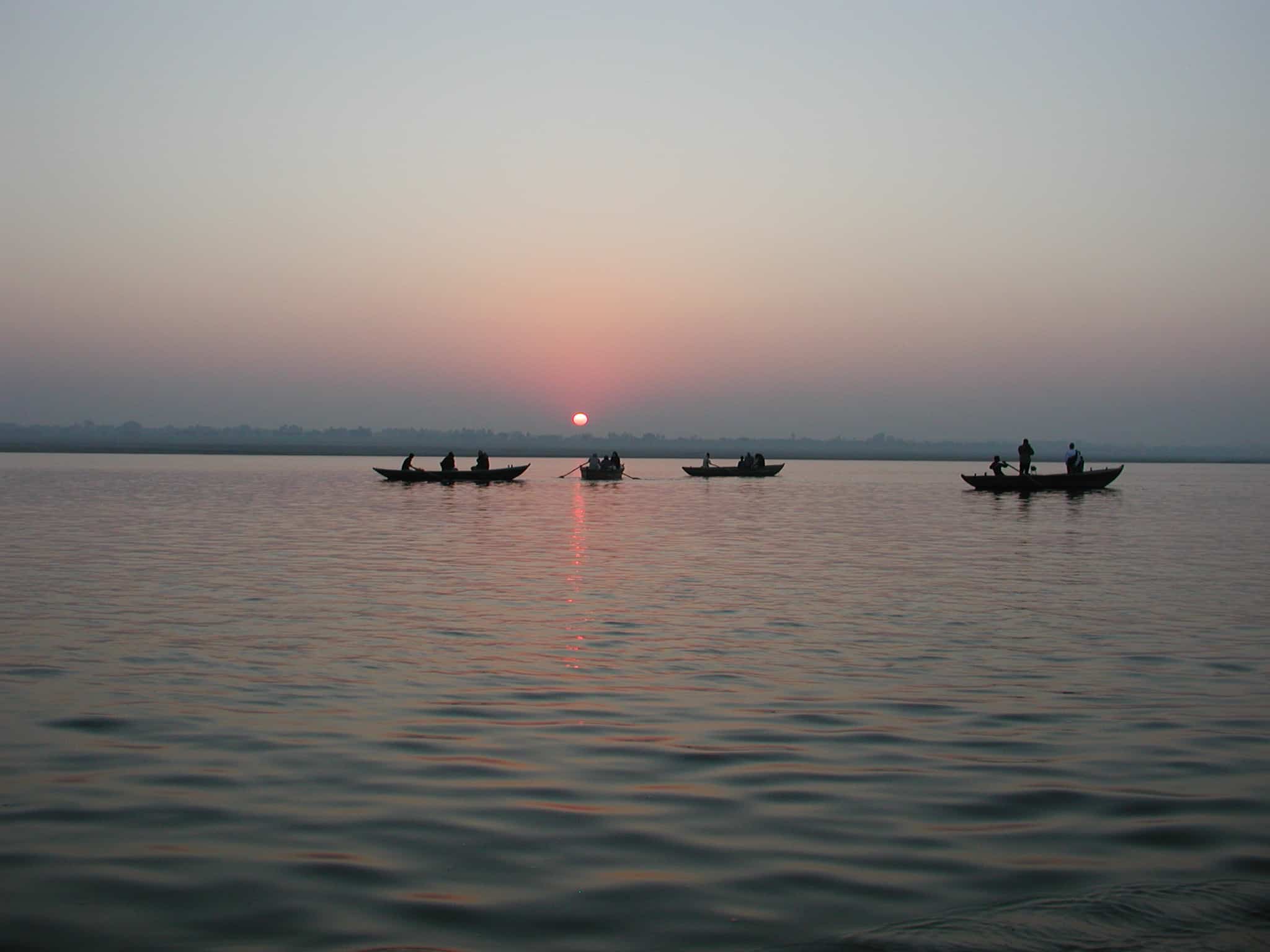 Solemn sunrise on the Ganges River in Varanasi, India, 2009, by Waheed Rabbani