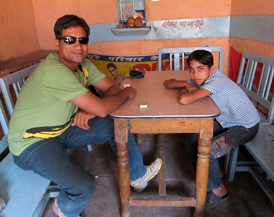 Photograph of Satish in chai shop, old city market, Sawai Madhopur