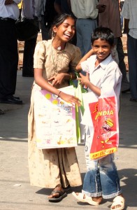 Photograph of children at a Mumbai train station