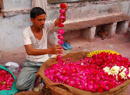 Photograph of flower seller in India