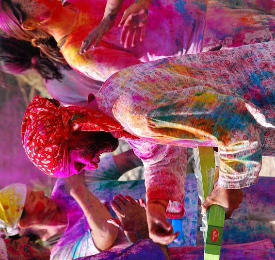 My teacher, Yogi Vishvketu of Anand Prakash Yoga Ashram in Rishikesh, India handing out sweets during Holi two years ago