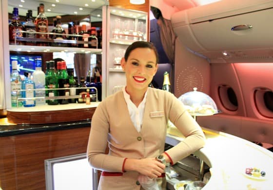 Millie Carlin presiding over the Emirates business class lounge with warmth and good cheer