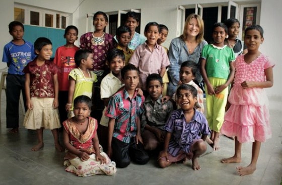 MW w kids Mariellen Ward surrounded by the children at TDH CORE in Tiruvannamalai, Tamil Nadu, India