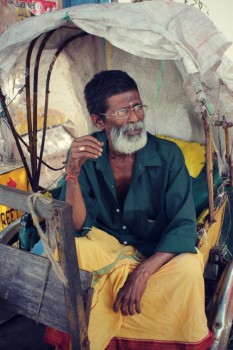 Rickshaw puller Rickshaw Puller, Near Kapaleeshwarar Temple, Chennai, Tamil Nadu, India