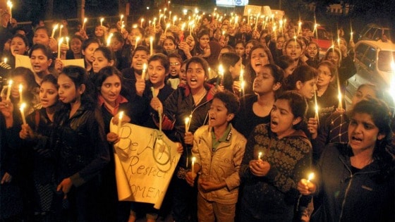 Students in India hold placards during a protest against the Delhi gang rape case. Photo: PTI