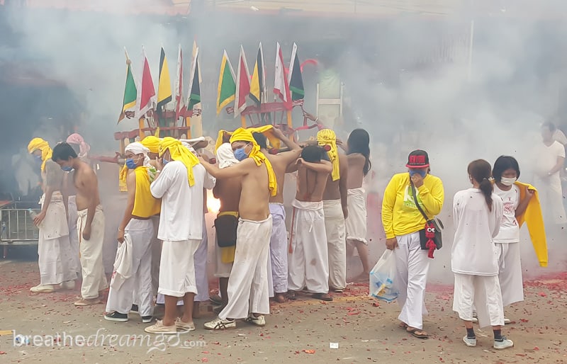 Crowd and fireworks at Vegetarian Festival, Phuket Thailand