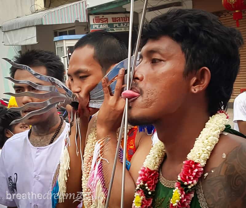 pierced faces at Vegetarian Festival, Phuket Thailand