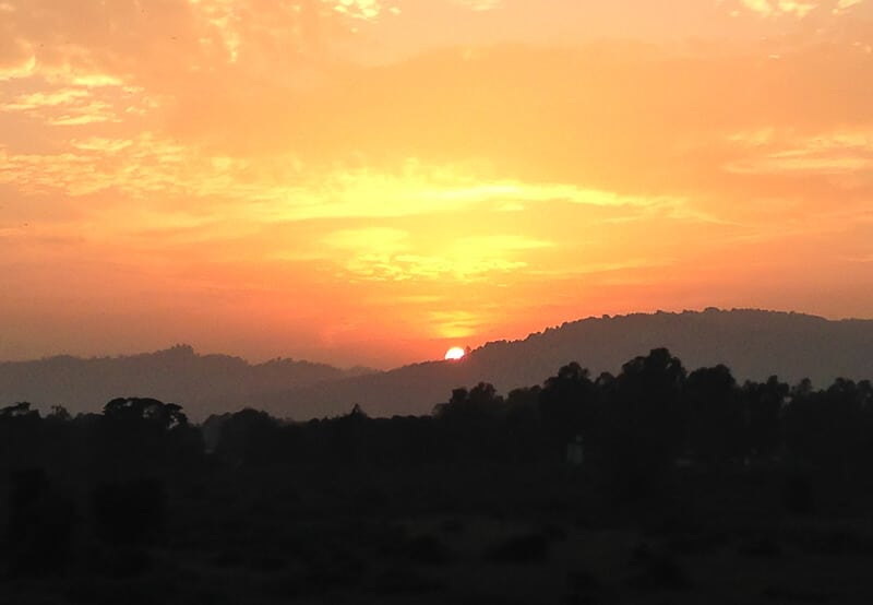 Orange and yellow streaked sky at sunrise at Aurovalley Ashram, India for International Yoga Day #YogaDay #India #IncredibleIndia Orange and yellow streaked sky at sunrise at Aurovalley Ashram, India for International Yoga Day #YogaDay #India #IncredibleIndia