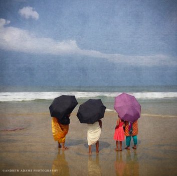 Beach umbrellas in Kerala India. Photo credit: Andrew Adams