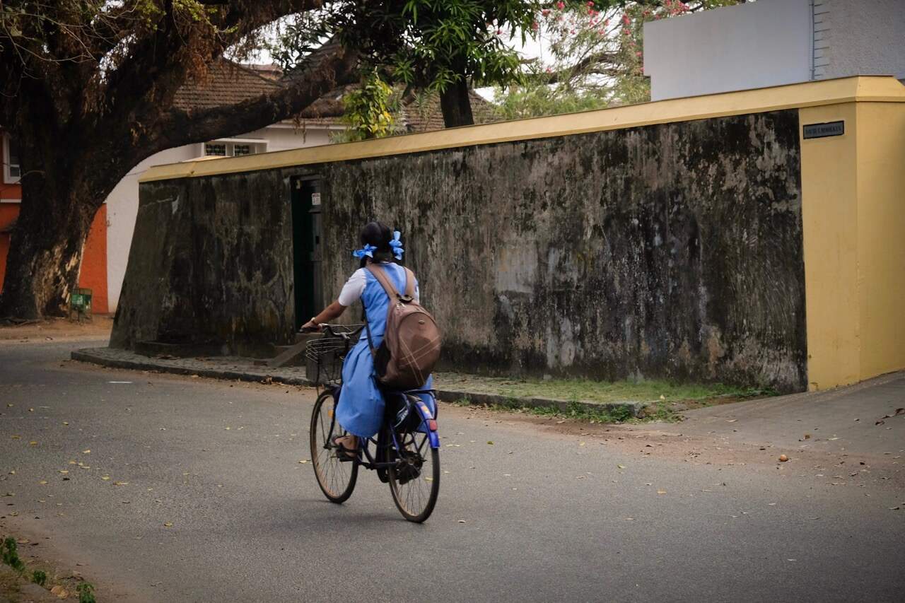 Girl on bicycle, Cochin / Fort Kochi, Kerala