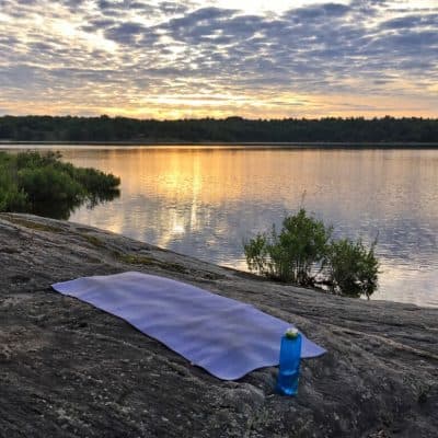 Responsible travel products: water bottle and yoga mat