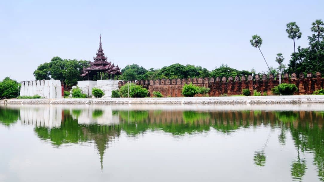 Myanmar travel photo: Mandalay temple and reflection in water