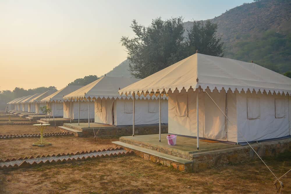 white luxury tents in the desert of Rajasthan