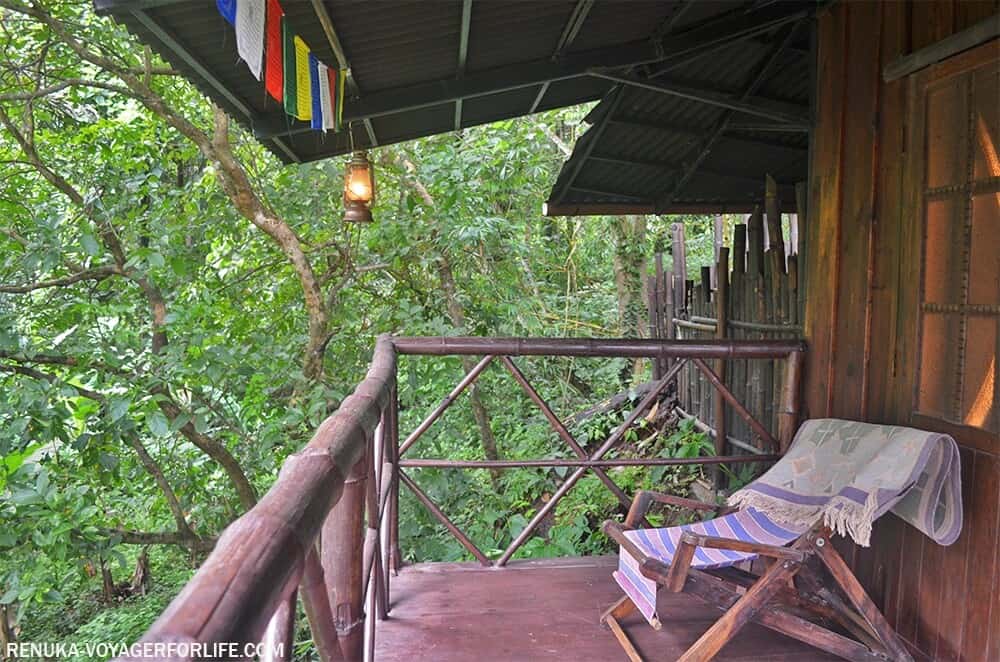 view of wooden balcony and forest in Goa