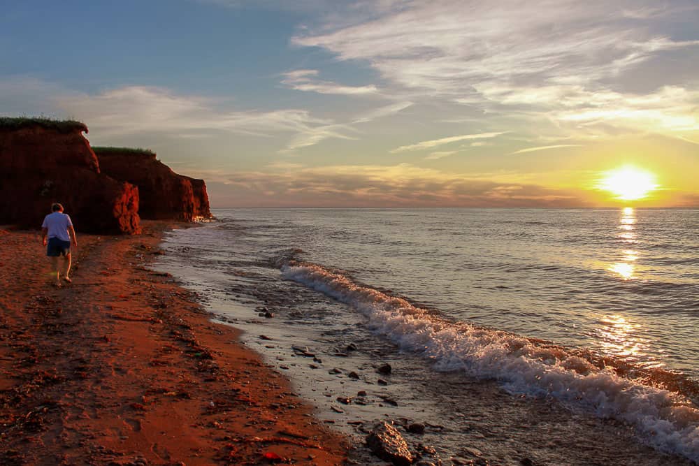 Prince Edward Island famous red sand beach at sunset