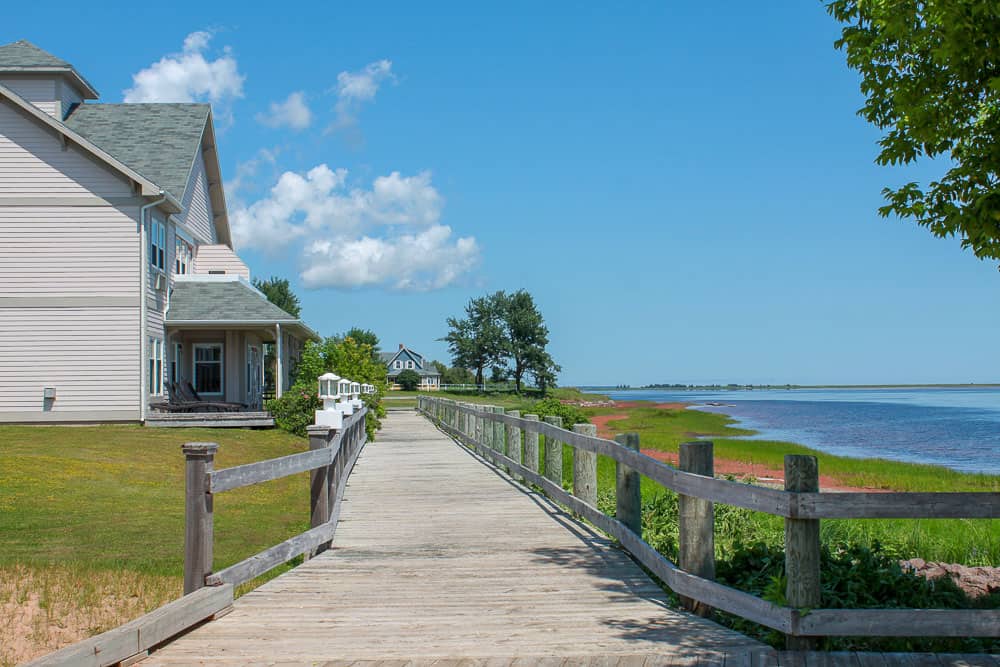 Wooden house, boardwalk, and water in PEI