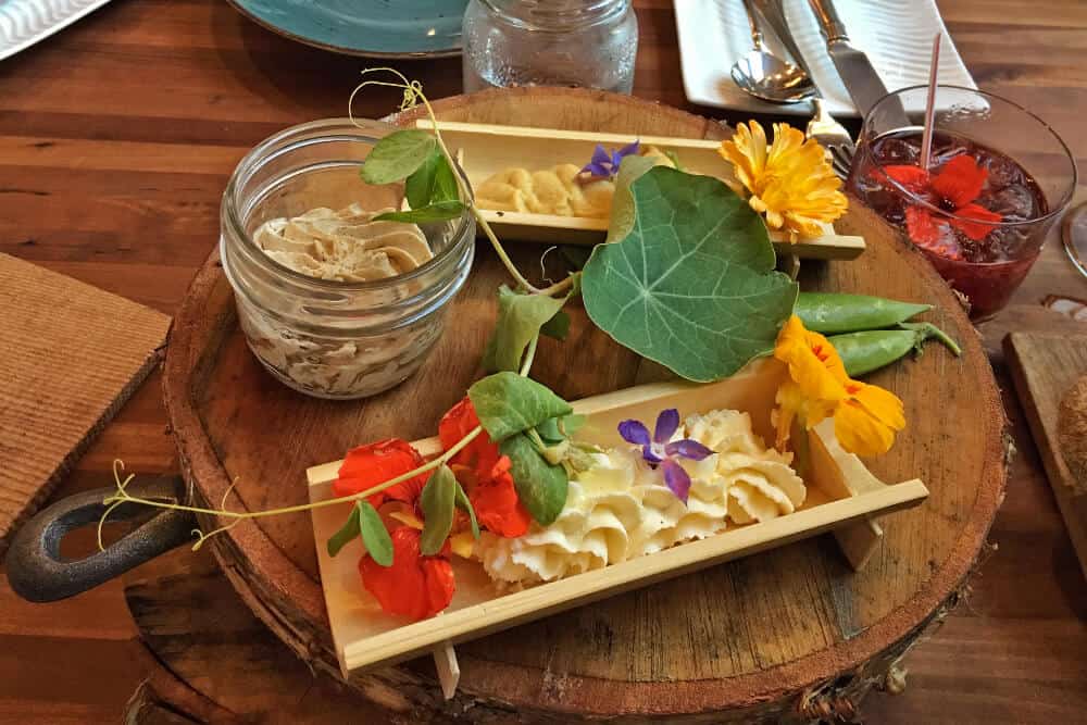 Food platter with flowers at the Inn at Bay Fortune, PEI, Canada