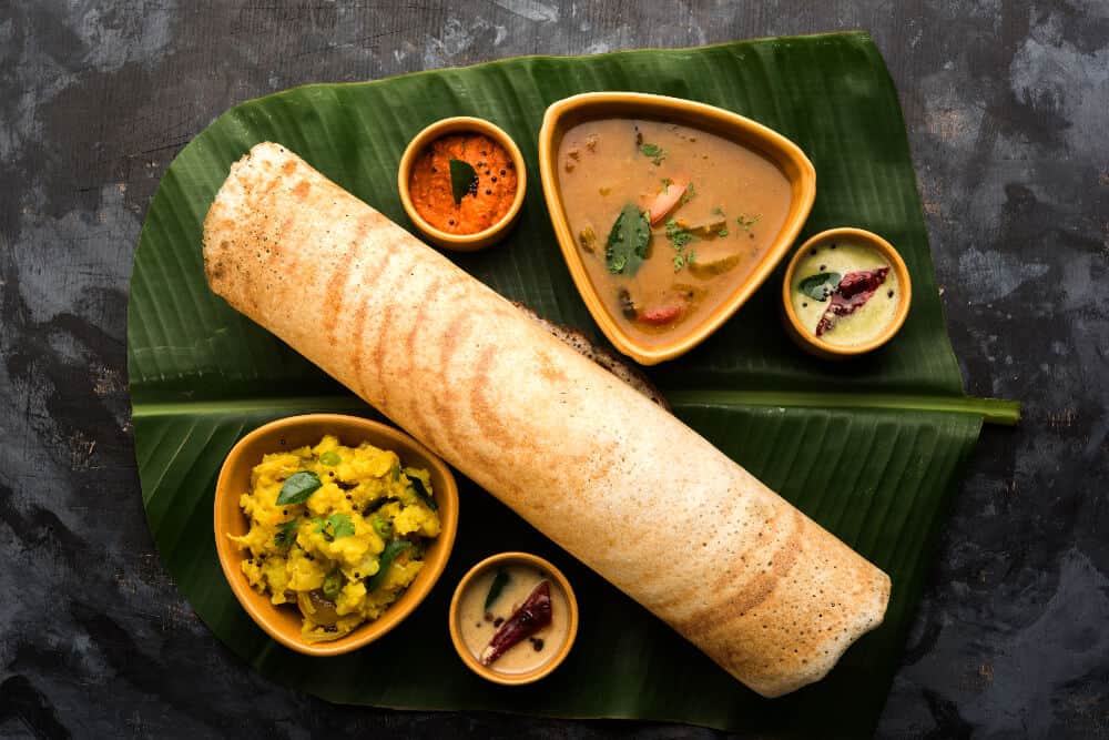 Dosa on a banana leaf is a famous Indian food