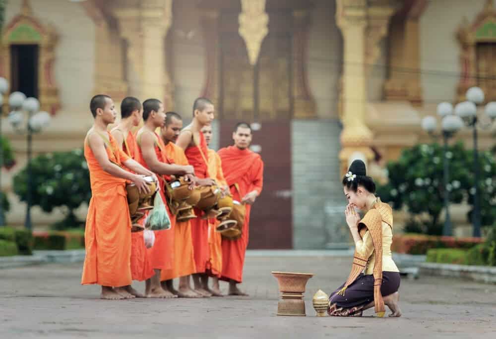 monks at prayer in Thailand