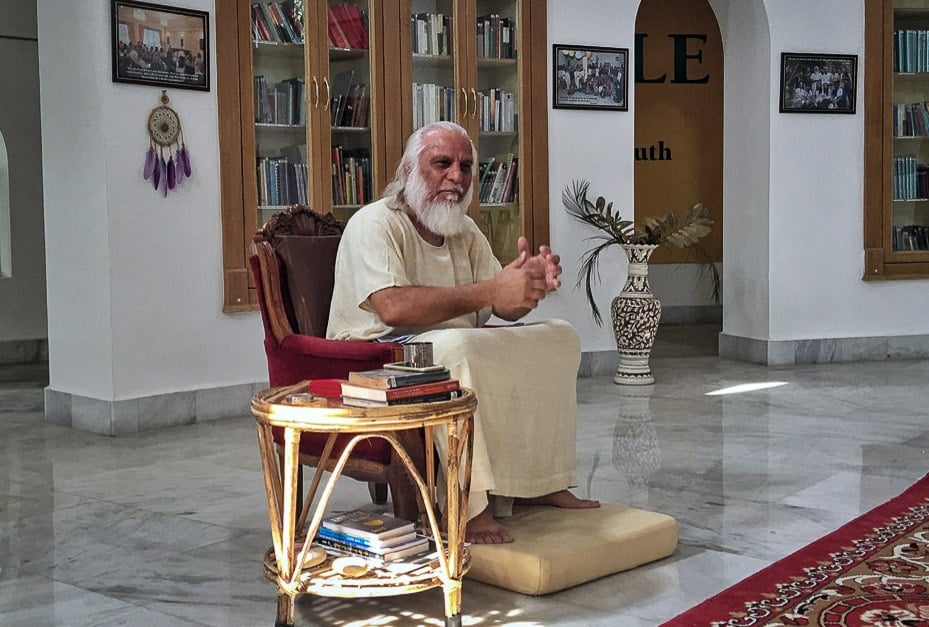 Swami Brahmdev in the library at Aurovalley Ashram