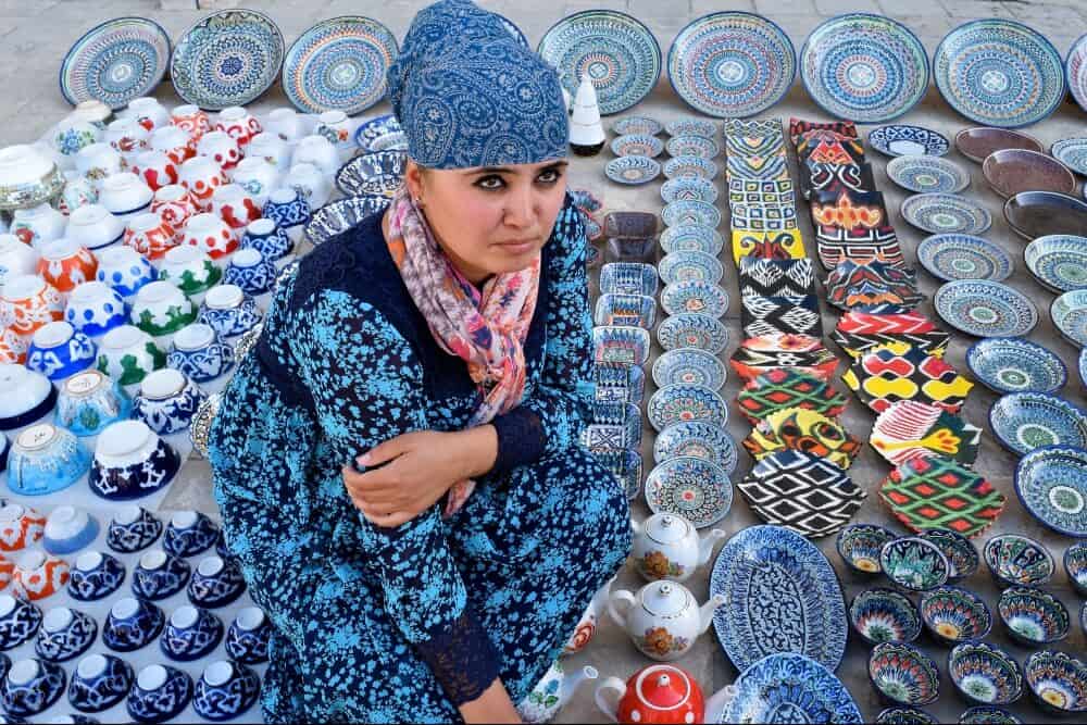 Woman selling ceramics in Uzbekistan