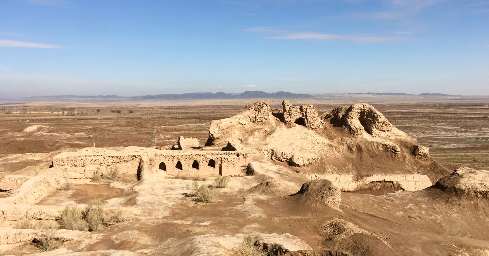 Desert fortress in Uzbekistan with mountains