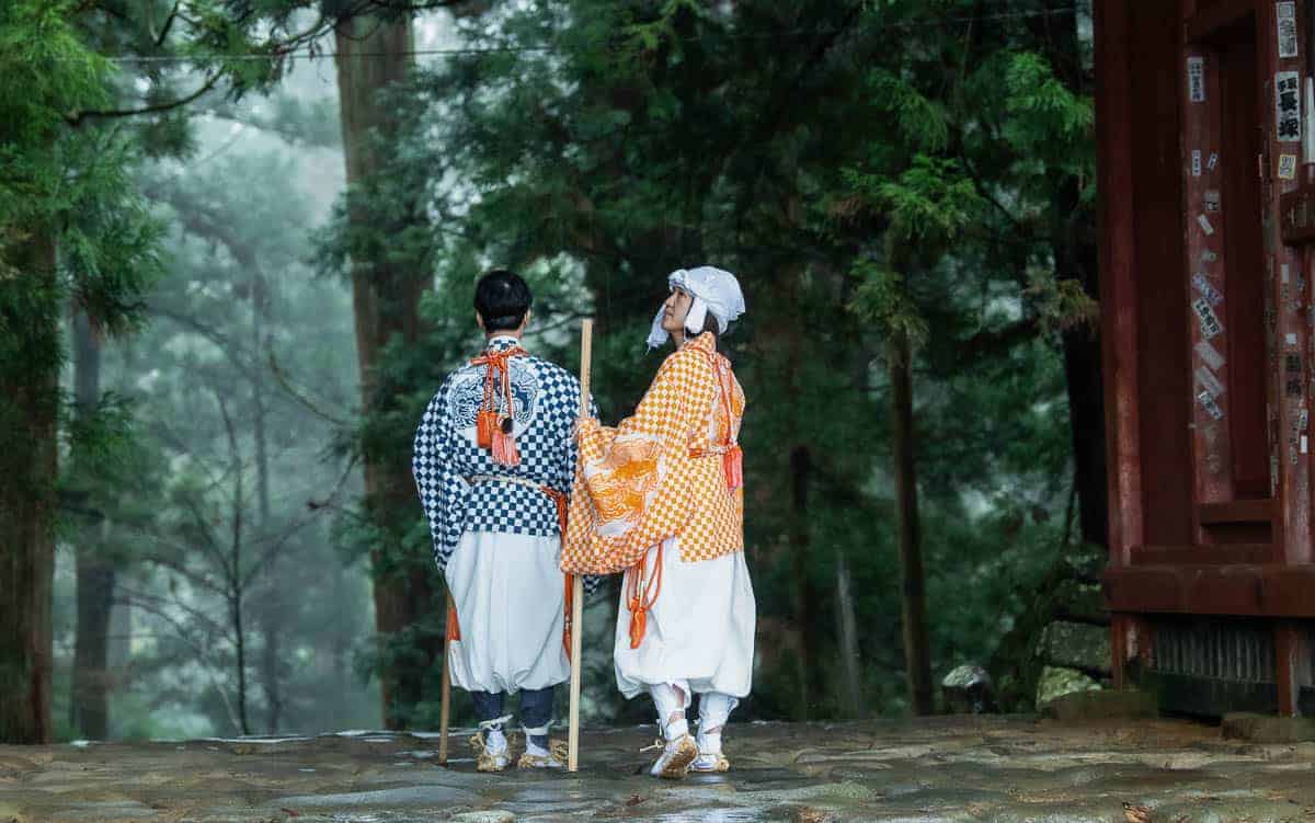 Female yamabushi approaching Mount Haguro, Tsuruoka, Japan