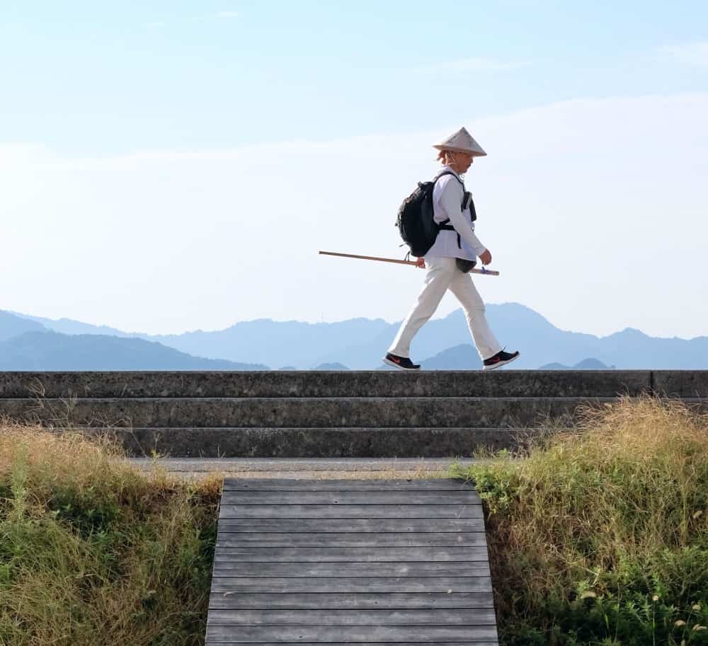 man walking in Shikoku, a place to visit in Japan