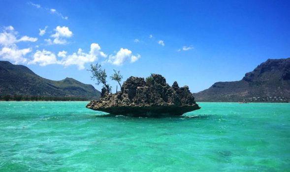 image of Le Morne Brabant mountain with blue sky and turquoise waters in Mauritius