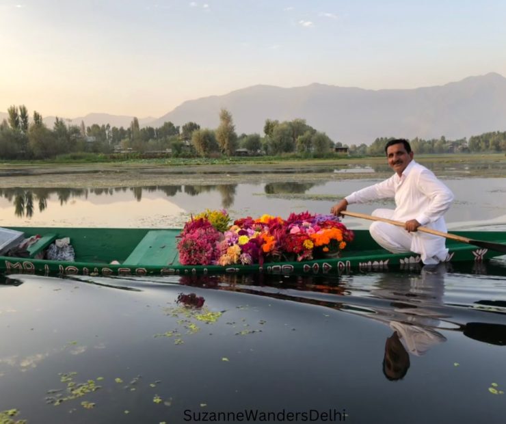 flower seller on Dal lake in Kashmir