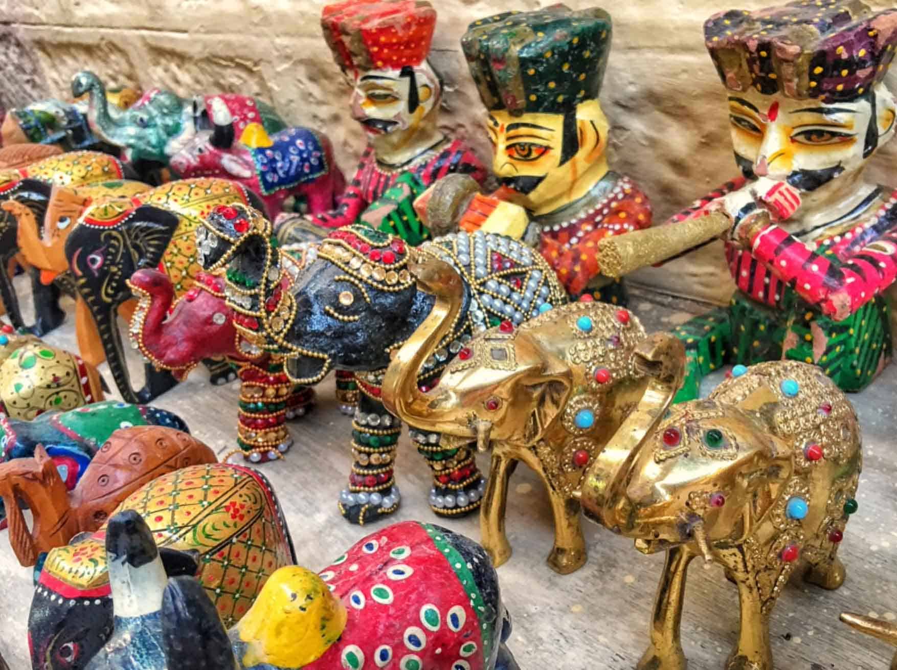 metal and paper figurines for sale at the market in Jaisalmer, Rajasthan