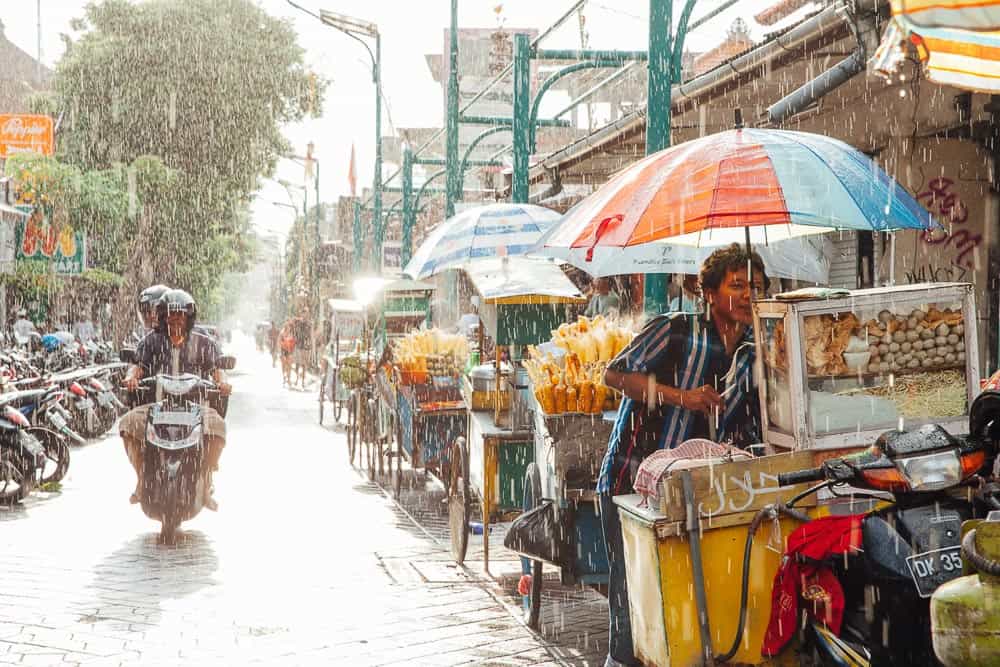 Street scene in Kuta, Bali, Indonesia during monsoon travel